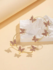 Fold-over rhinestone butterfly embellishment