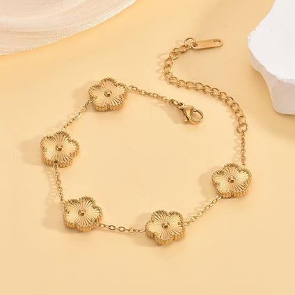 Golden floral bracelet for elegant hand adornment
