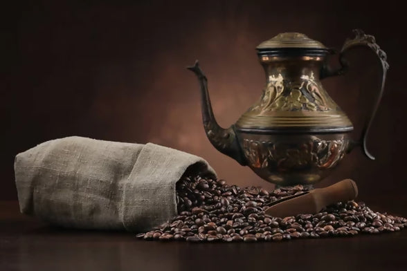 depositphotos_468085240-stock-photo-arabic-kettle-coffee-beans-burlap
