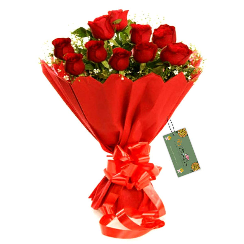The FloralMart® Fresh Flower Bouquet of 08 Red Roses in Paper Packing