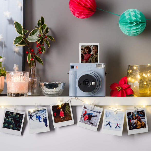 كاميرا Fujifilm Instax SQ1 الفورية f = 65.75 ، حجم الصورة 62x62 مع تكبير بصري x1 ، أزرق جليدي