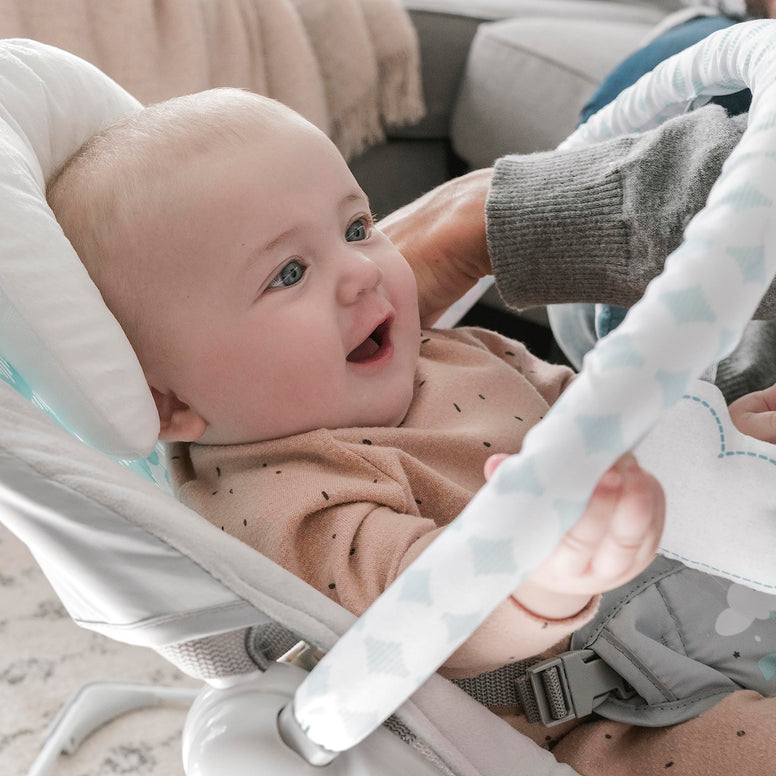 Ingenuity Bouncity Bounce Deluxe Bouncer, Portable Bouncing Baby Seat with Overhead Mobile, and Calming Vibration