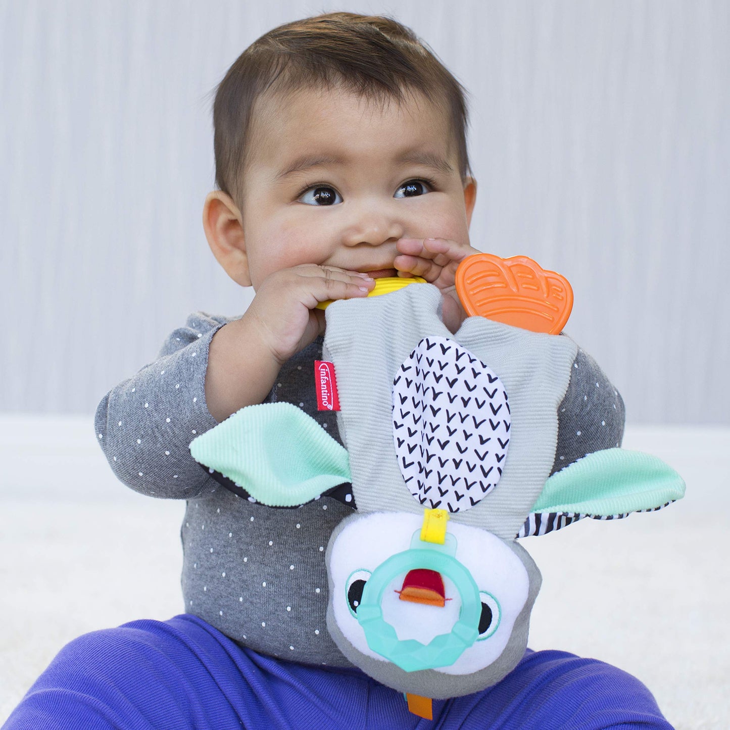 Infantino Cuddly Teether Penguin For Sensory Exploration - Silicone Teether, Teething Relief